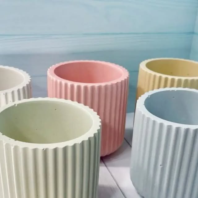 Pastel ribbed concrete jars